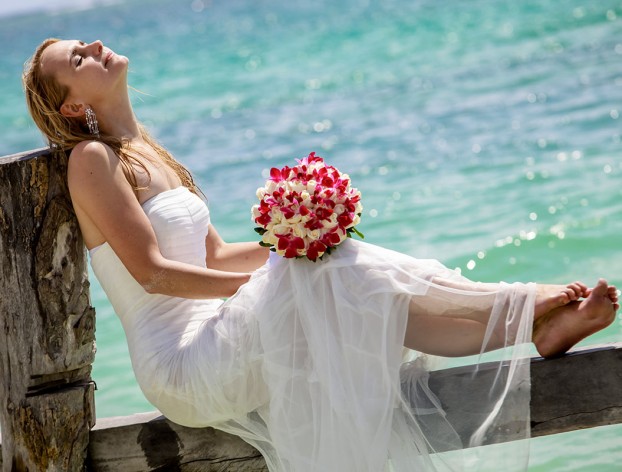 Margaritaville Island Reserve- beach wedding - bride chilling.