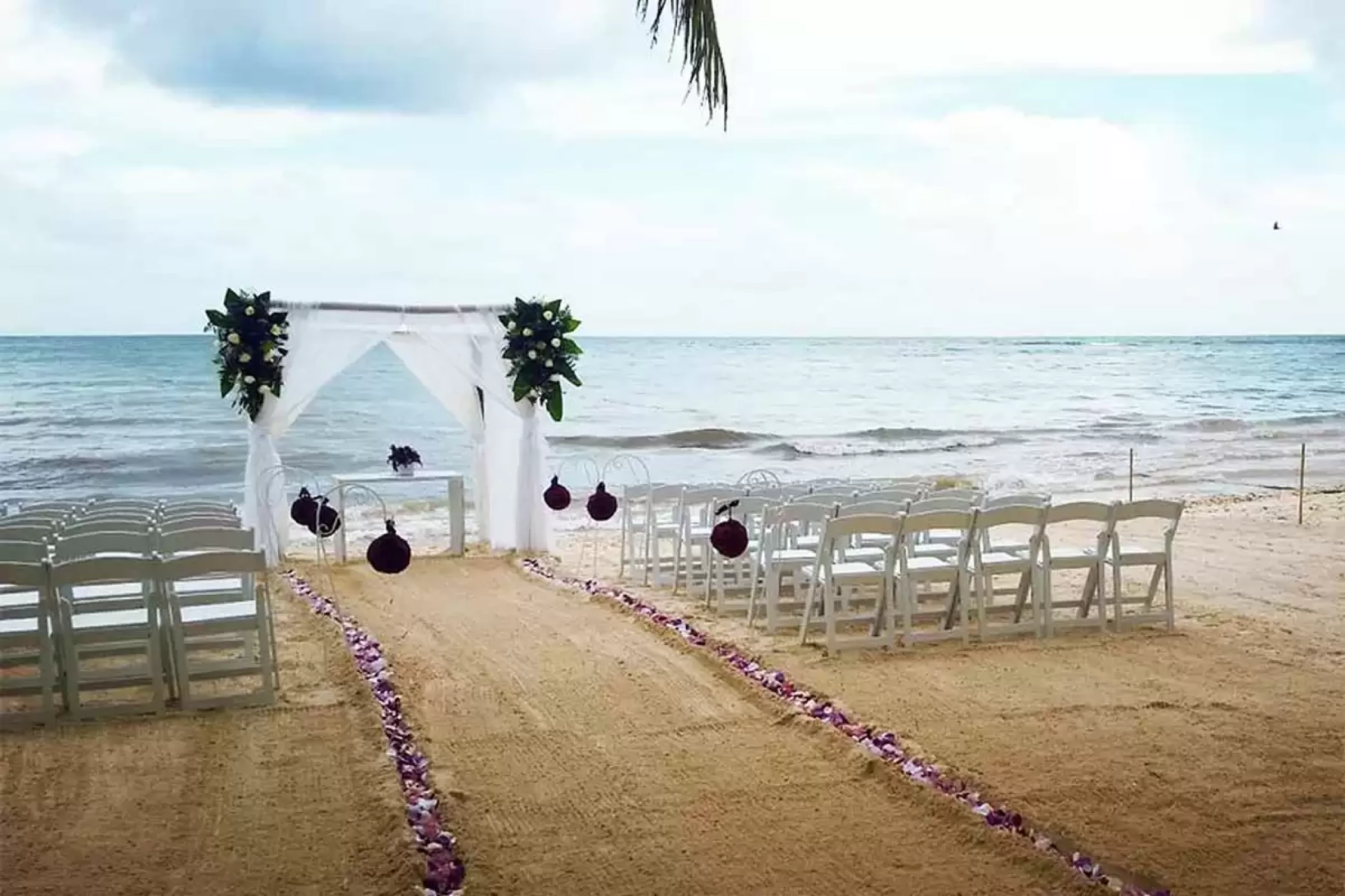 Ceremony decor in the beach at Catalonia Royal Tulum