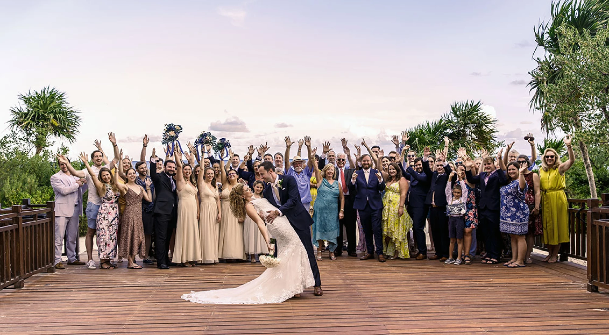 Wedding couple enjoying with their group.