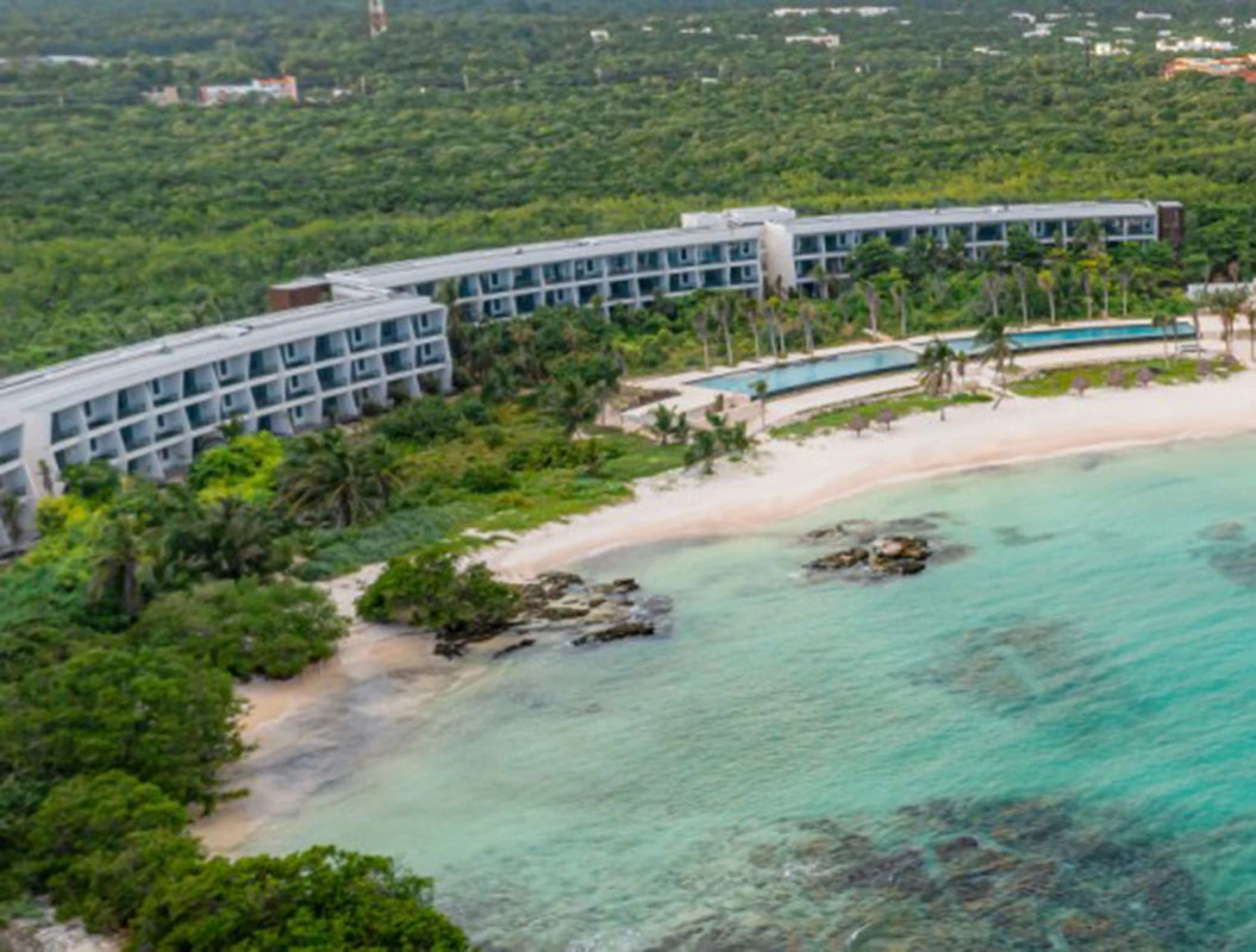 Conrad Tulum aereal view of beach.