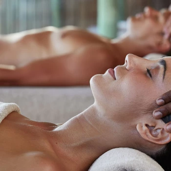 Conrad Tulum couple at spa getting massages.