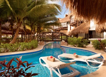 El Dorado Casitas secluded pool with palm trees