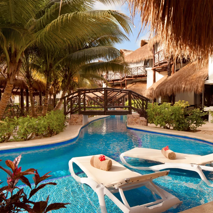 El Dorado Casitas secluded pool with palm trees