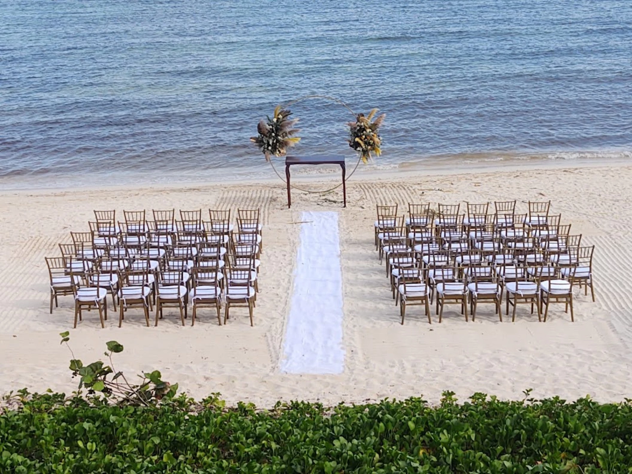 Ceremony decor on the beach at Dreams Jade Resort and Spa