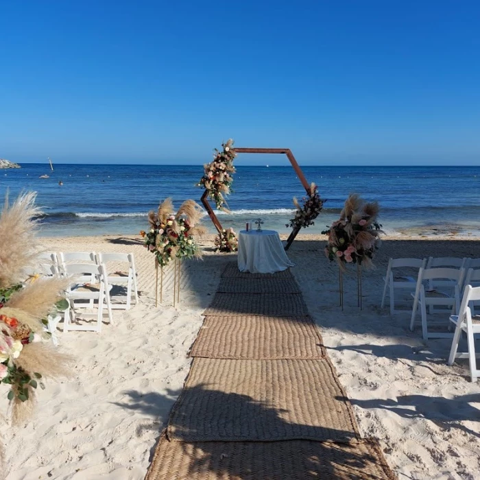 Ceremony decor on the beach at Dreams Jade Resort and Spa