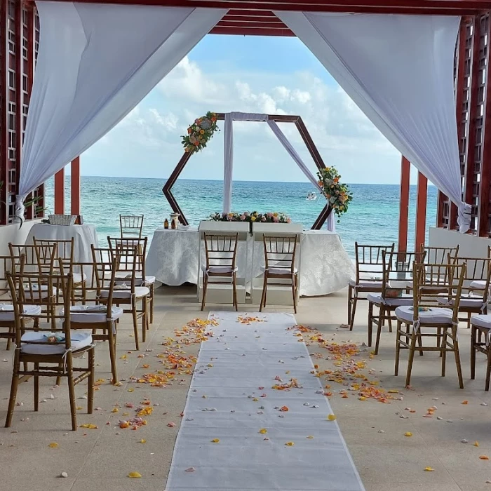 Ceremony decor on the pergola deck at dreams jade resort and spa