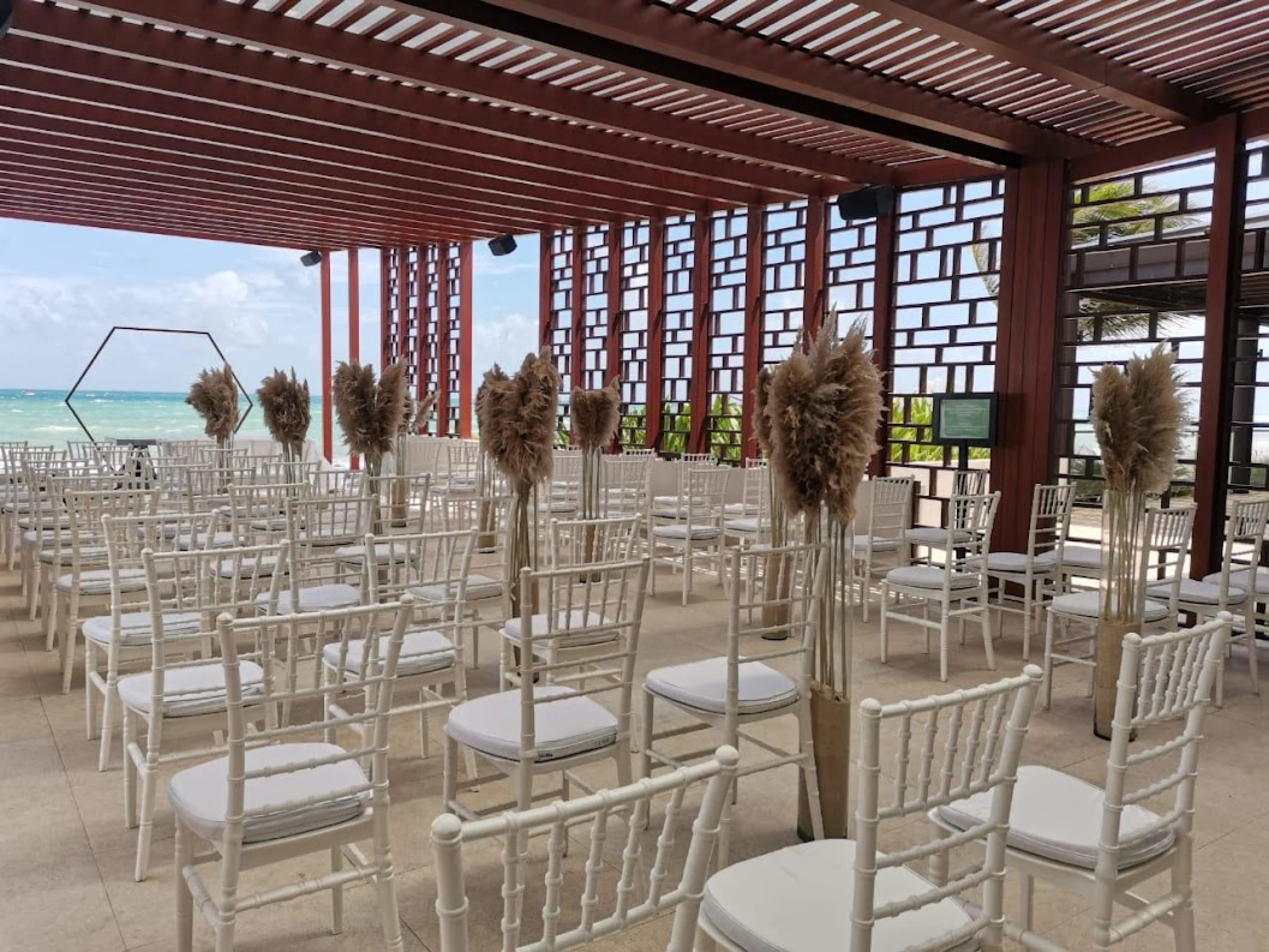 Ceremony decor on the beach at Dreams jade resort and spa