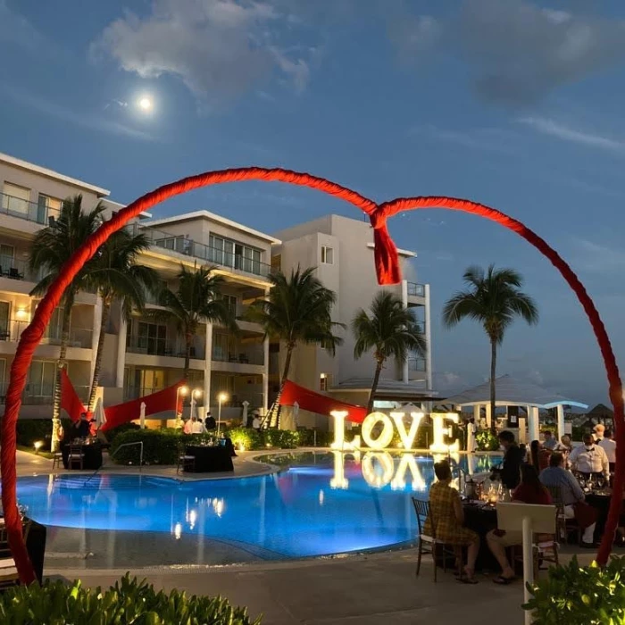 Ceremony decor on the pool terrace at dreams jade resort and spa