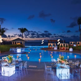 Dinner reception in pool area at Dreams Jade Resort and Spa