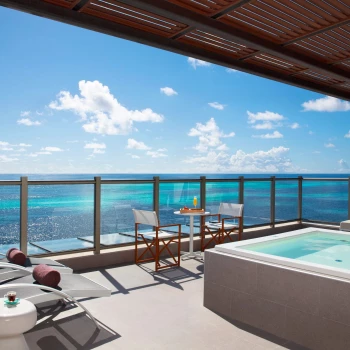 Dreams Natura Resort oceanfront room balcony with hot tub