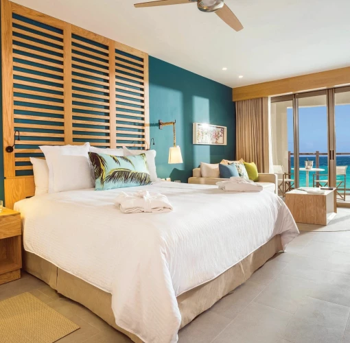 beachfront room king bed at Dreams Natura Resort and spa