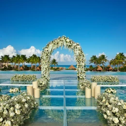 Weddings altar pool at Dreams Playa Mujeres golf and spa