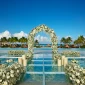 Weddings altar pool at Dreams Playa Mujeres golf and spa