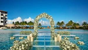 Weddings altar pool at Dreams Playa Mujeres golf and spa