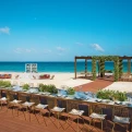 Dreams Sapphire beach wedding venue with long table