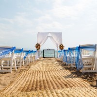Ceremony decor on the beach at Dreams Vallarta Bar Resort and Spa