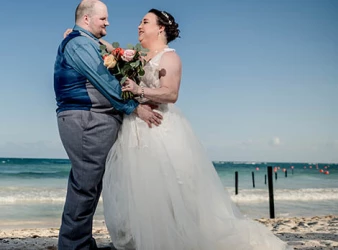 groom and bride on the beach