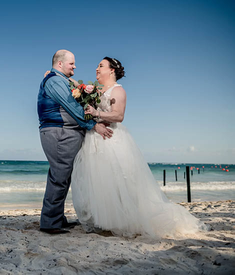 groom and bride on the beach