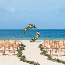 Symbolic ceremony in beach wedding venue at Excellence Playa Mujeres