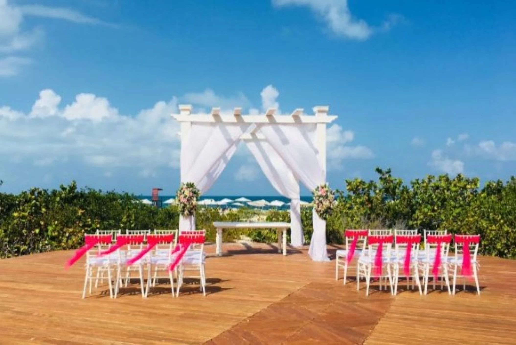 Ceremony decor on the beach deck at Grand Palladium Costa Mujeres