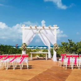 Ceremony decor on the beach deck at Grand Palladium Costa Mujeres