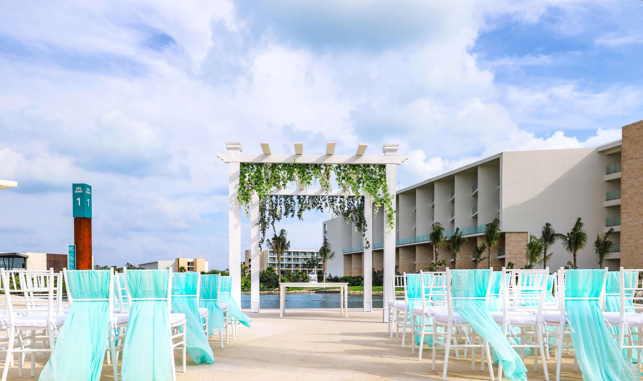 Ceremony decor on the villages deck at Grand Palladium Costa Mujeres