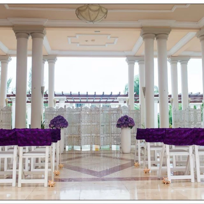 Ceremony in the angesl atrium at GRAND PALLADIUM LADY HAMILTON RESORT & SPA