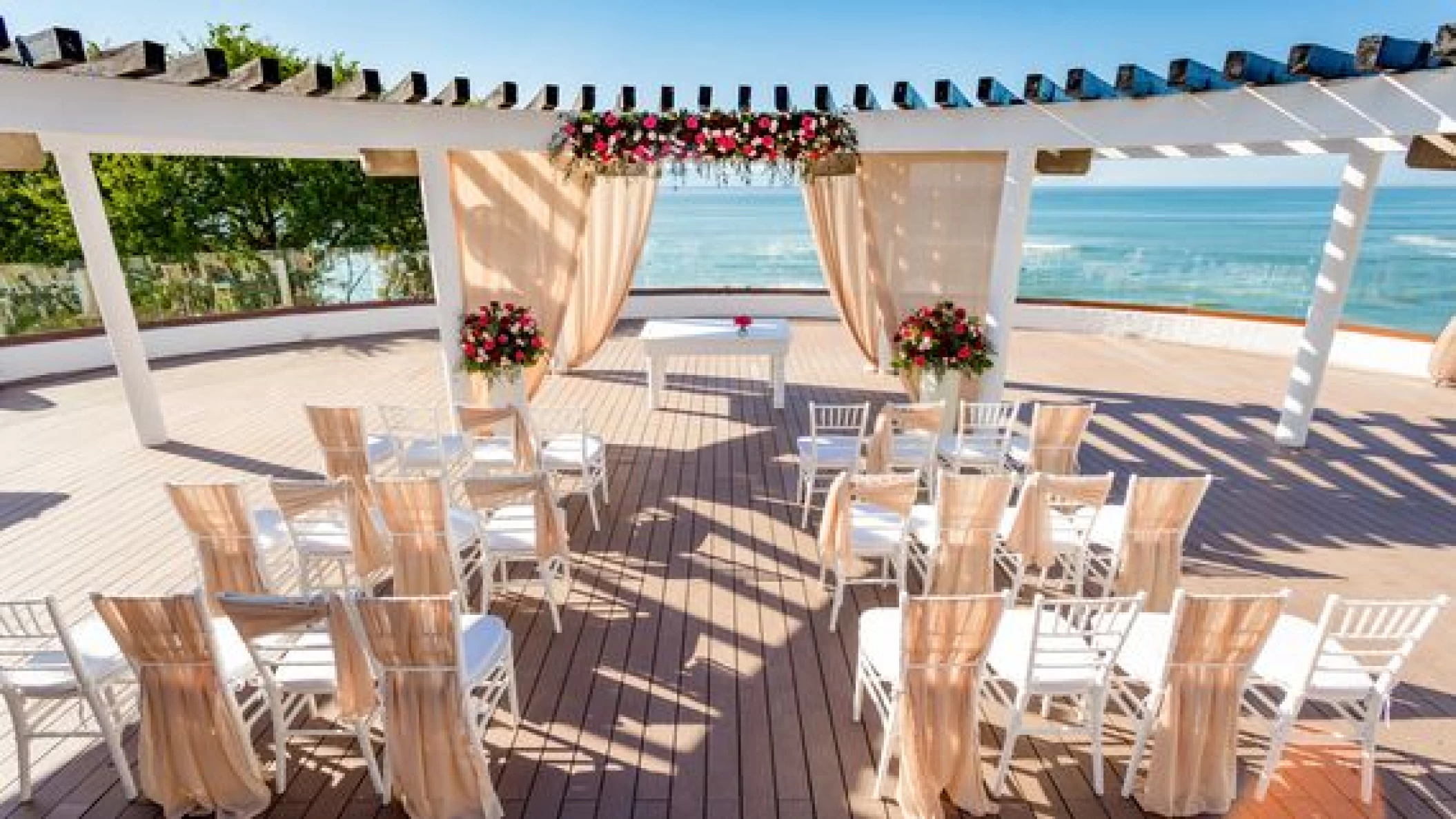 Ceremony decor on sunset sky terrace at grand palladium vallarta