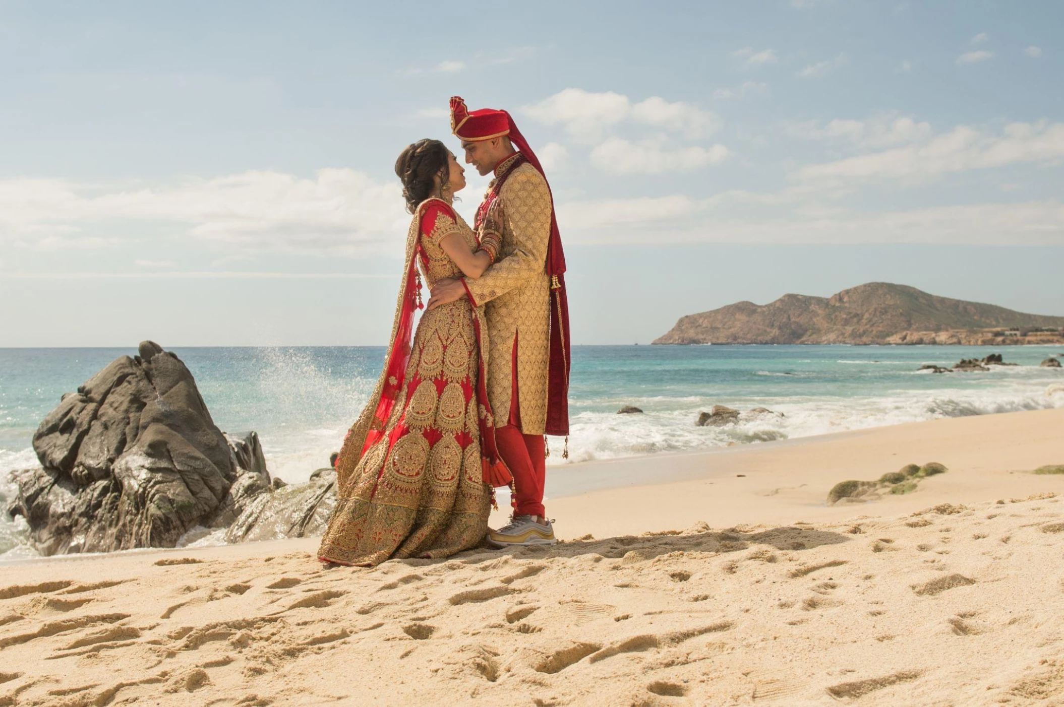 Indian couple on the azul beach at grand velas los cabos