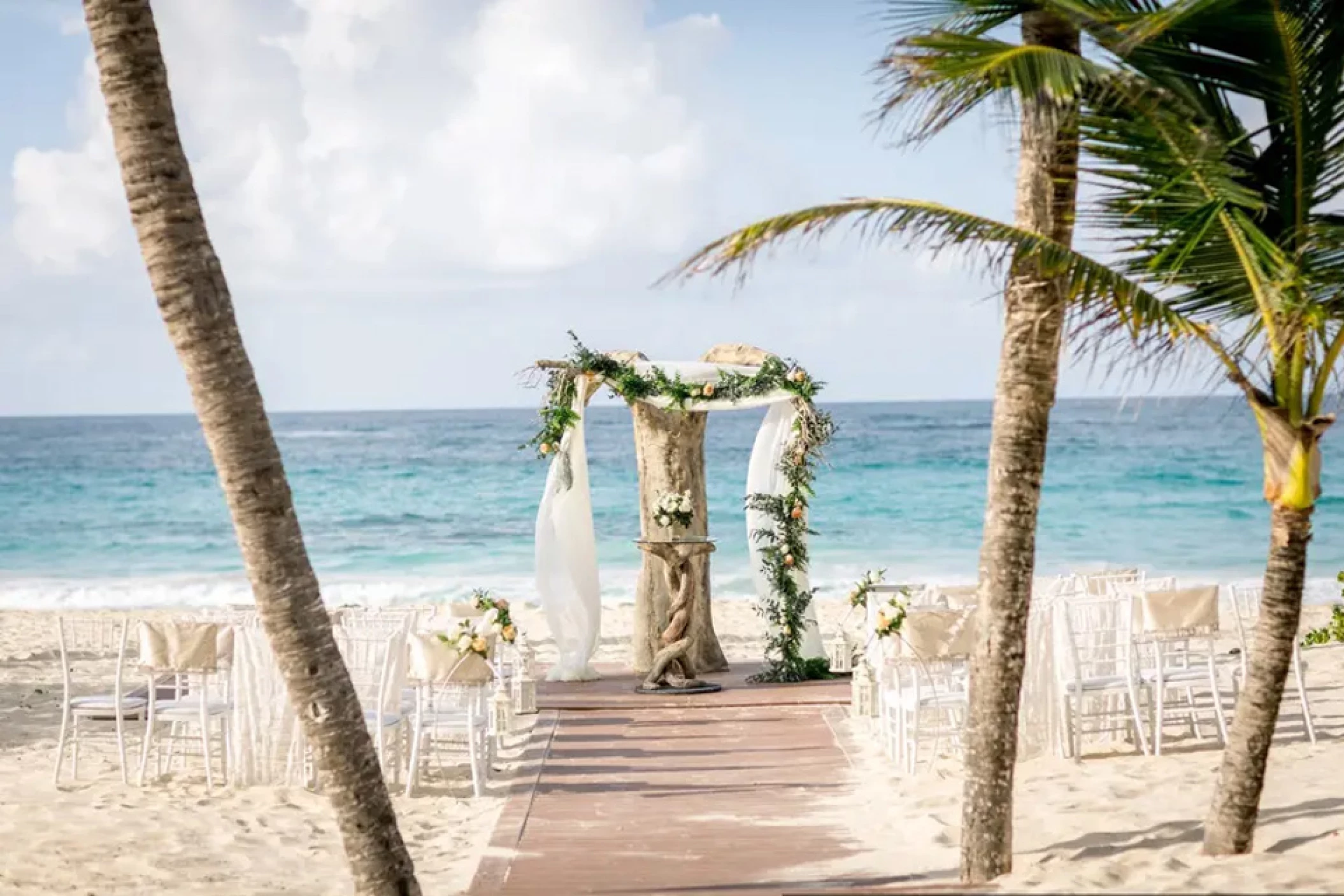 Ceremony decor on harmonica palafite wedding venue at Hard Rock Punta Cana