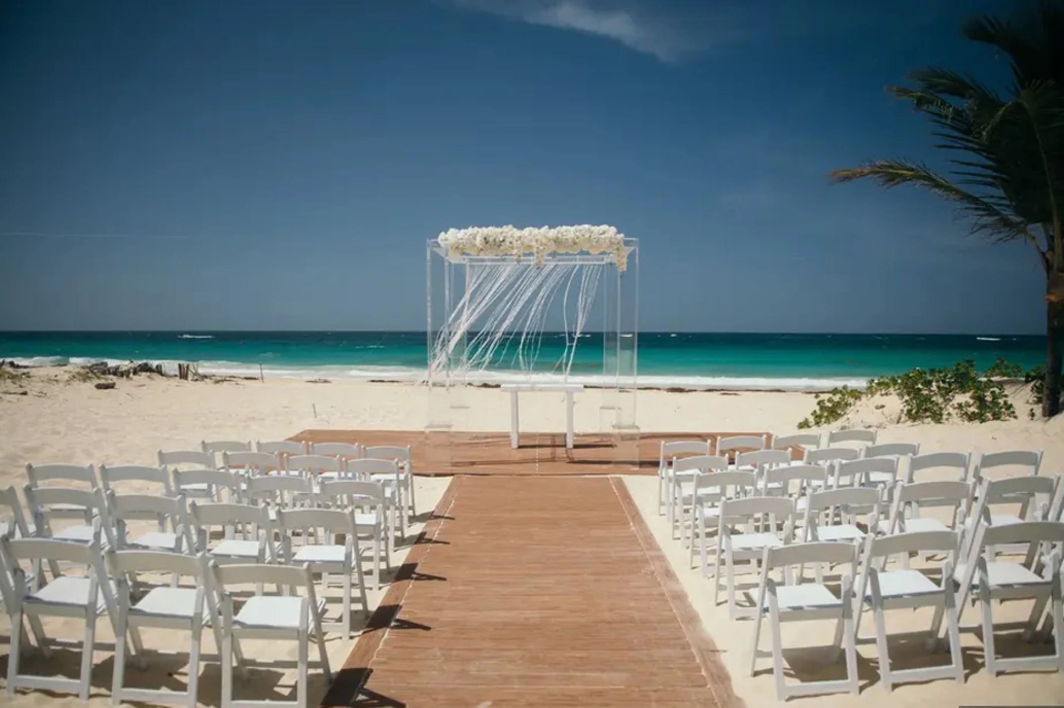 Ceremony decor on harmonica palafite wedding venue at Hard Rock Punta Cana