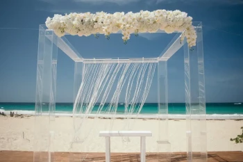 Ceremony decor on harmonica palafite wedding venue at Hard Rock Punta Cana