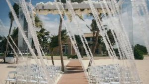 Ceremony decor on harmonica palafite wedding venue at Hard Rock Punta Cana