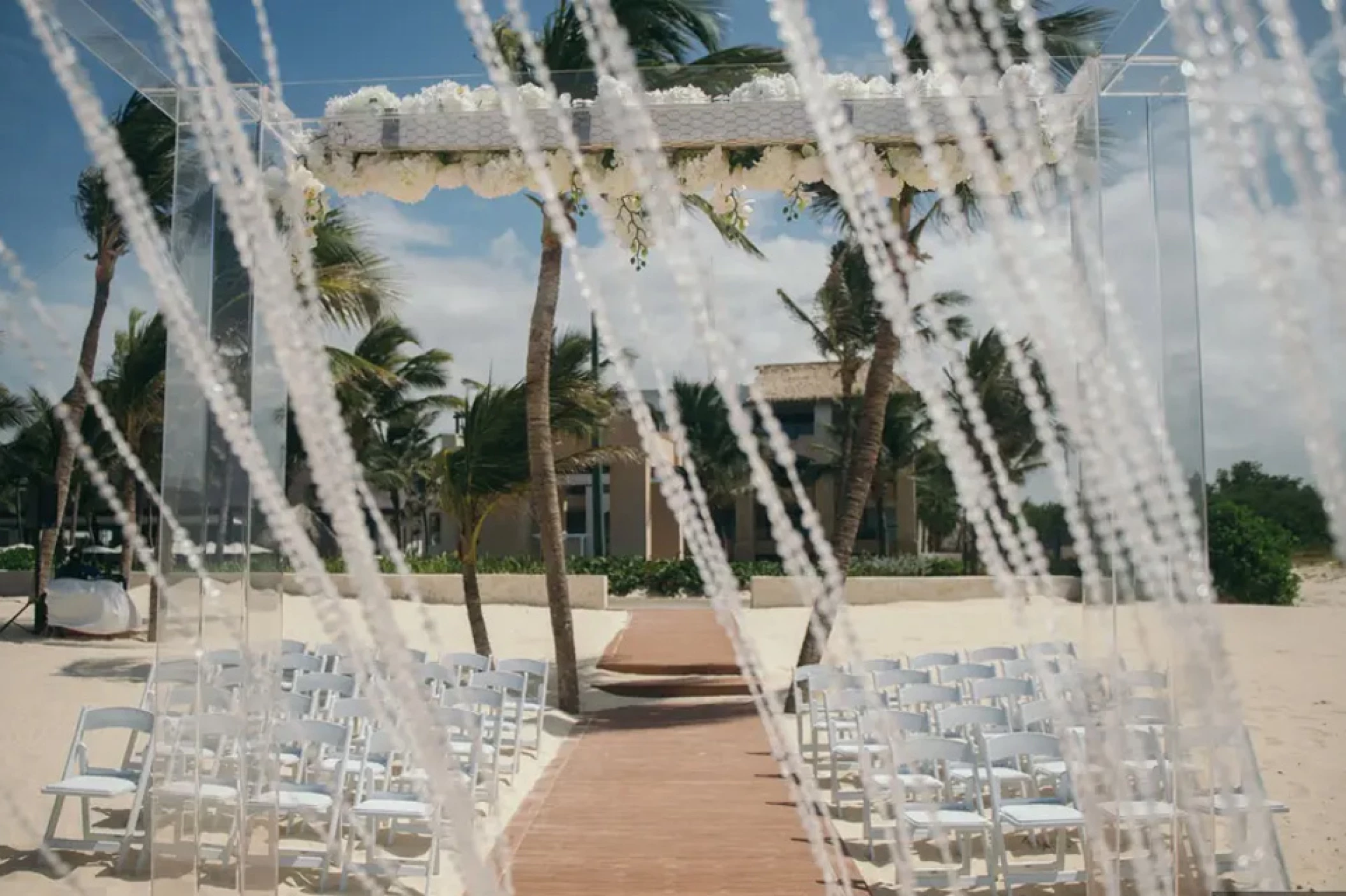 Ceremony decor on harmonica palafite wedding venue at Hard Rock Punta Cana