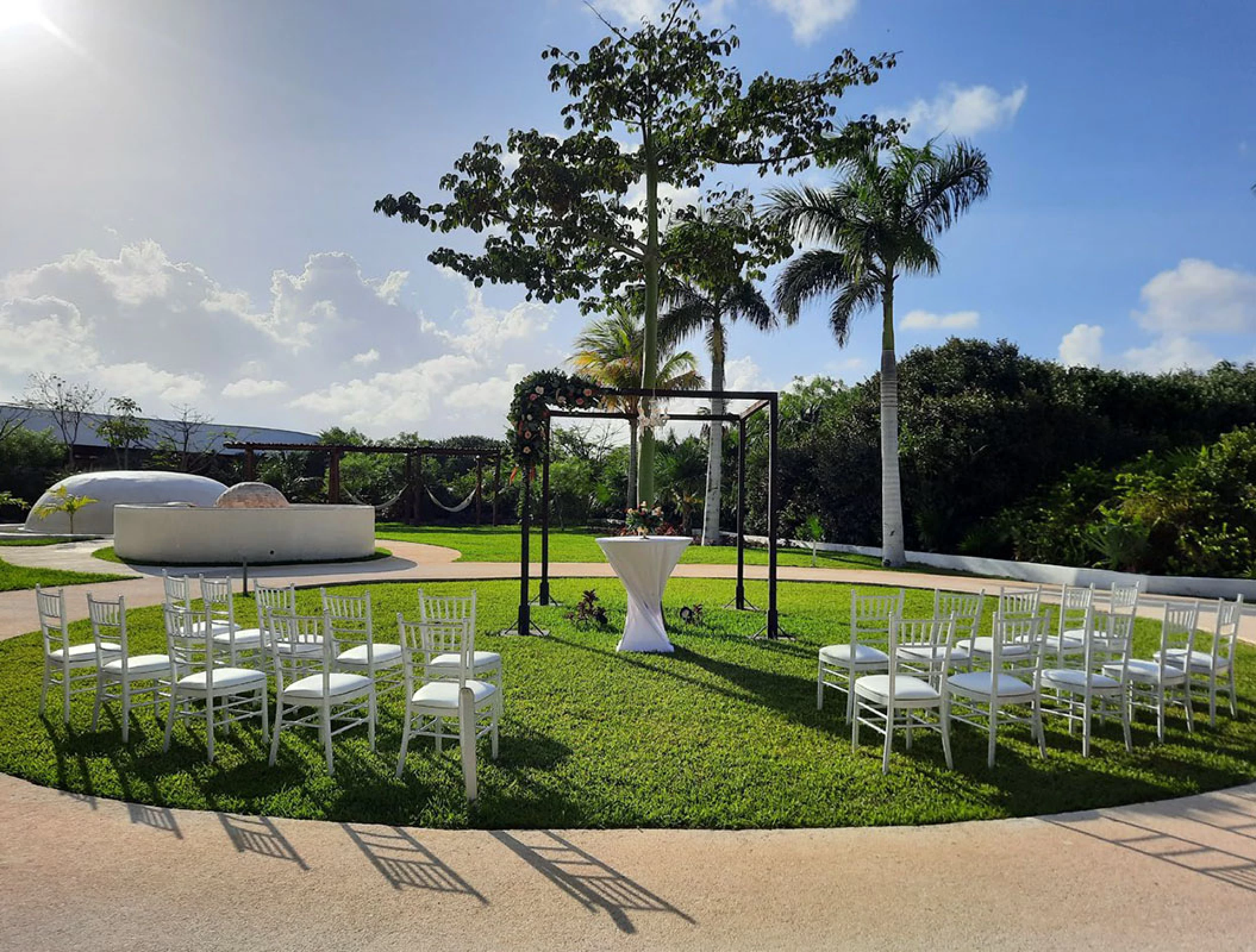 Ceremony setup in La Ceiba Garden venue at Haven Riviera Cancun Resort.