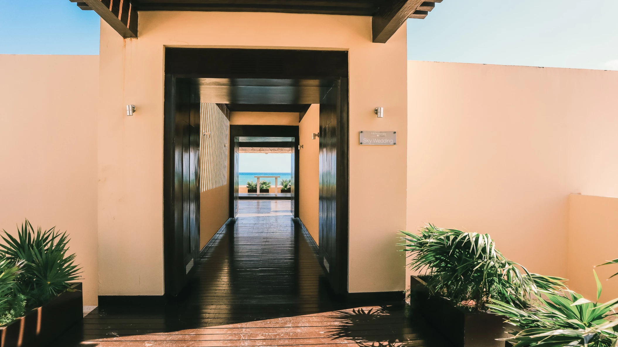 Hideaway at Royalton Riviera Cancun sky terrace wedding venue hallway