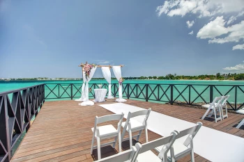 Ceremony decor in the charmin ocean pier at Hideaway at Royalton Negril