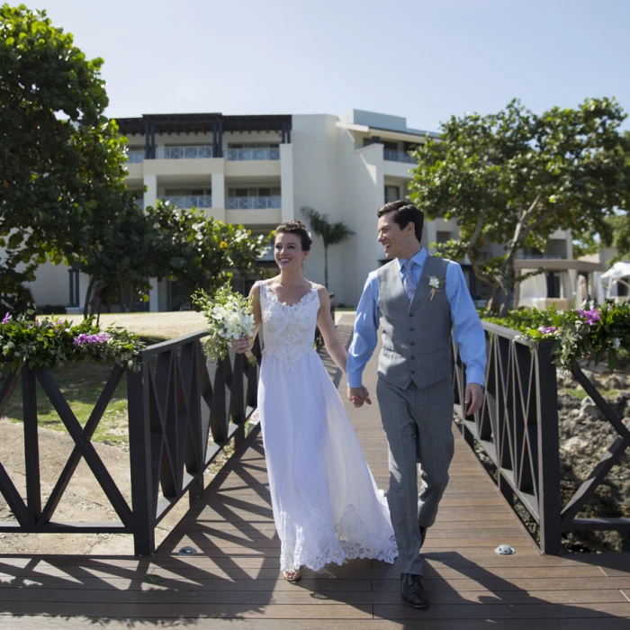 Couple on the ocean pier at Hideaway at Royalton Negril