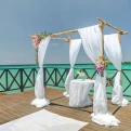 Ceremony decor in the charmin ocean pier at Hideaway at Royalton Negril