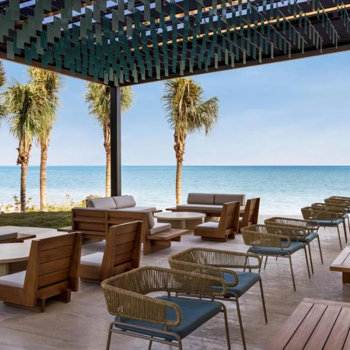 Hilton Cancun Outdoors lounge area.