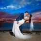 Just married Couple at the beach in Hilton Cancun.