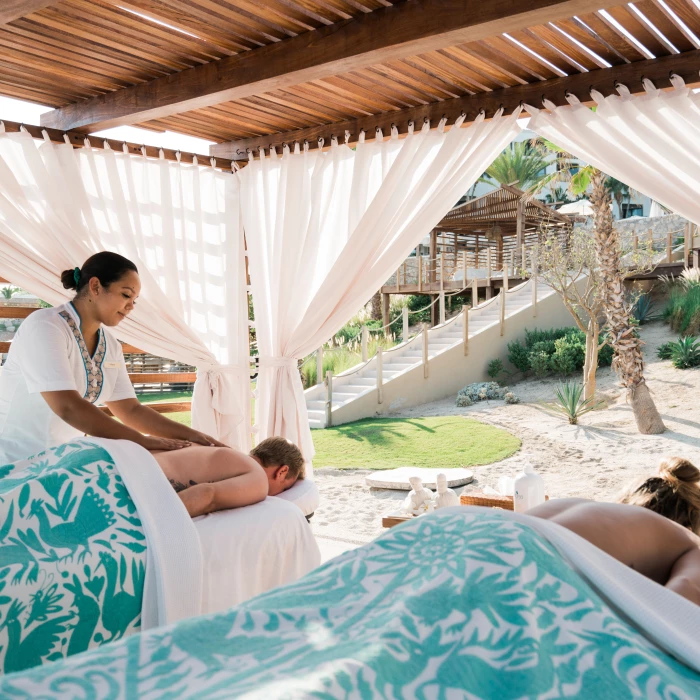 Couple massage on the beach spa at Hilton Los Cabos Beach and Golf