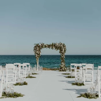 Ceremony decor on the beach wedding venue at Hilton Los Cabos Beach and Golf