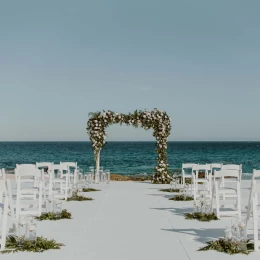 Ceremony decor on the beach wedding venue at Hilton Los Cabos Beach and Golf