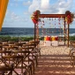 Beach wedding venue setup at Hilton Tulum.