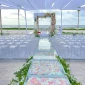 Hilton Tulum's beach venue wedding ceremony setup.