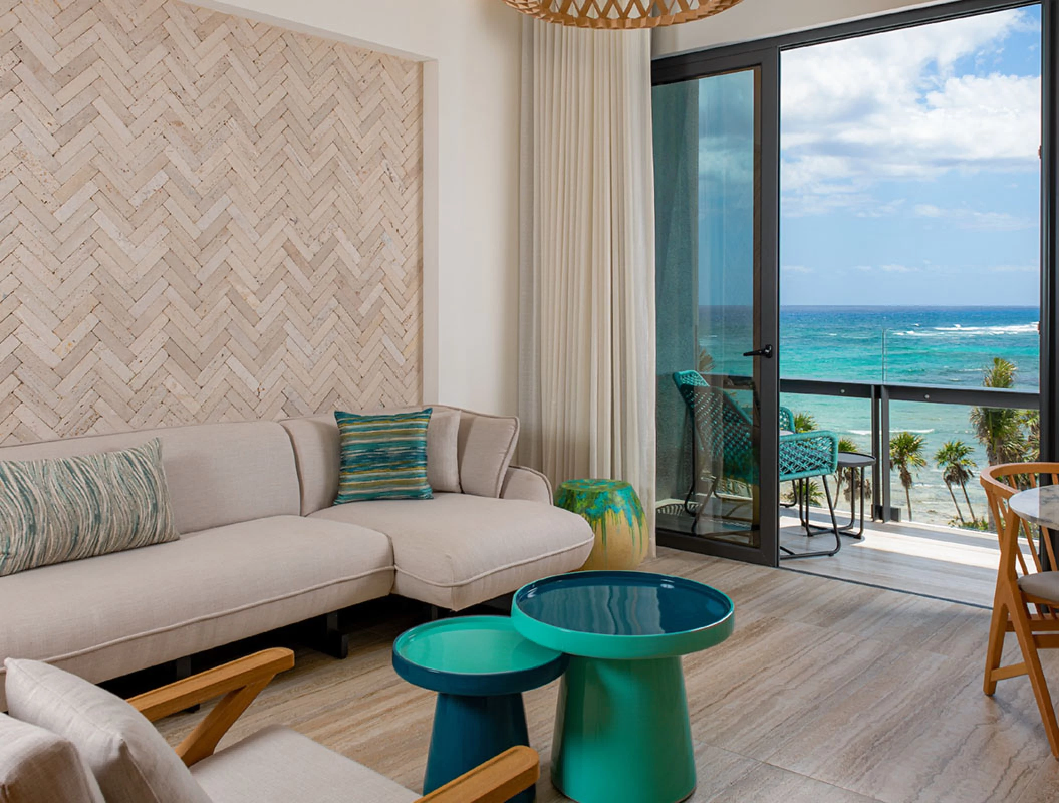 Ocean view suite living-room at Hilton Tulum.