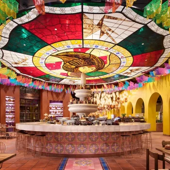 Xcaret Arte restaurant with colorful ceiling