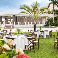 Dinner reception in central garden wedding venue at Hyatt Ziva Riviera Cancun