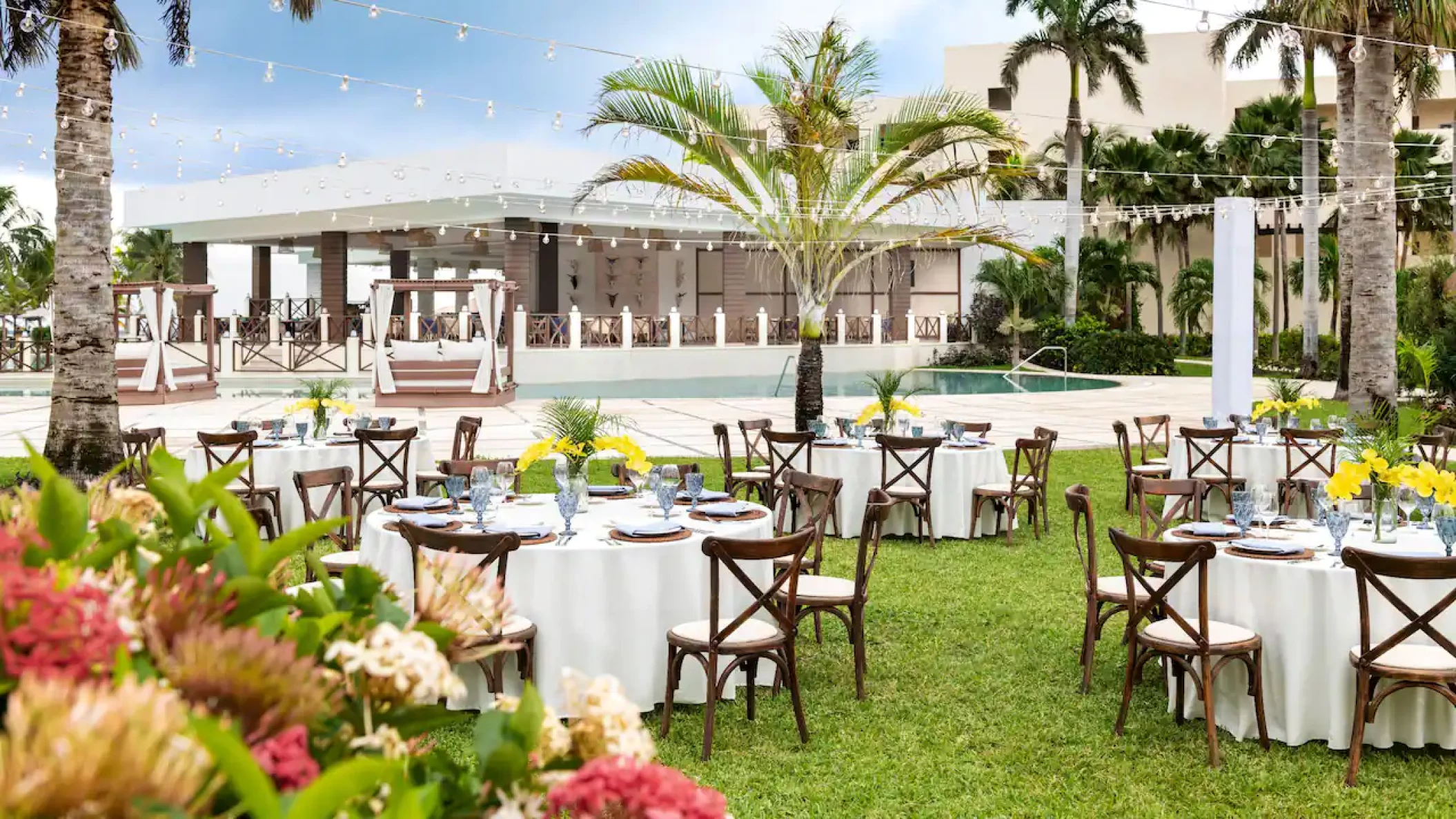 Dinner reception in central garden wedding venue at Hyatt Ziva Riviera Cancun